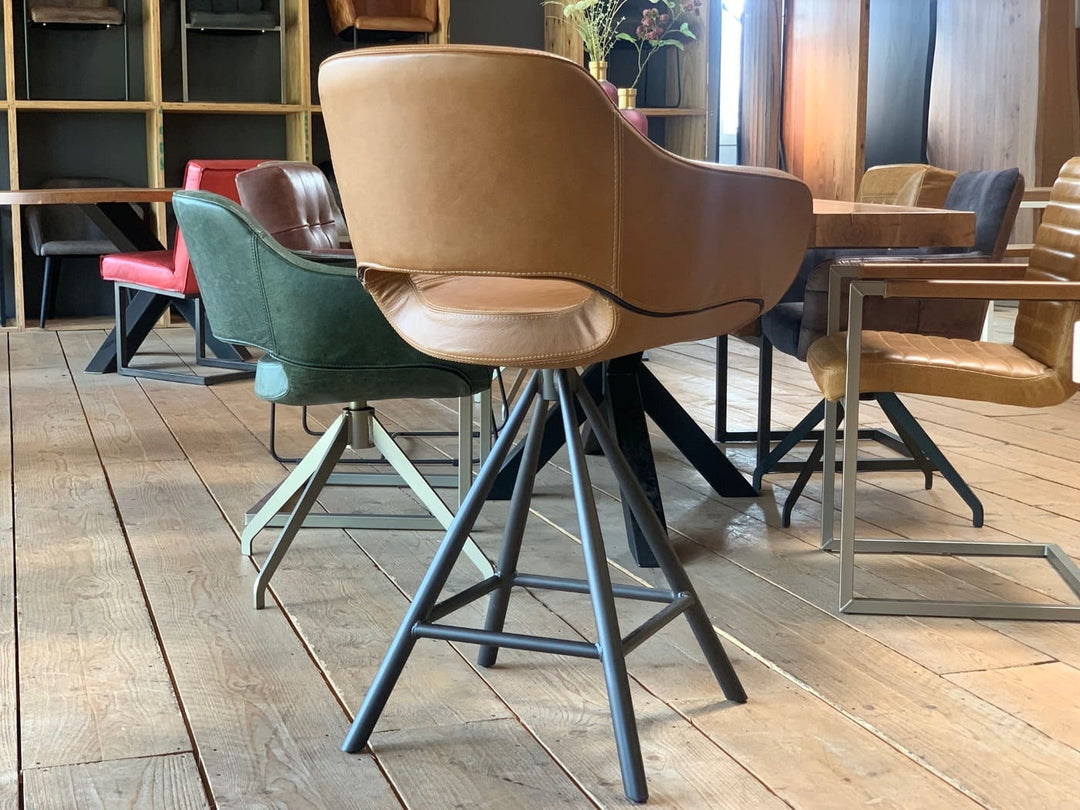 Barhocker Echtleder drehbar Rückansicht, moderner Tresenstuhl mit gepolsterter Sitzschale und stabilem Metallgestell, hochwertiges Design für stilvolle Küchen- und Essbereiche.