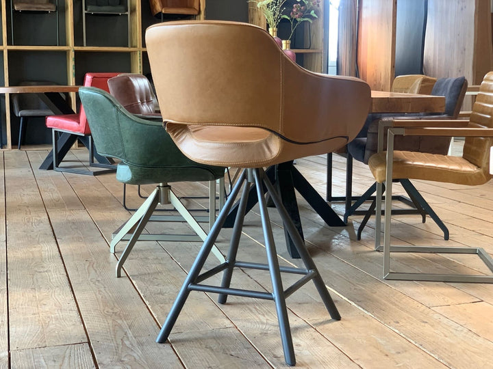 Barhocker Echtleder drehbar Rückansicht, moderner Tresenstuhl mit gepolsterter Sitzschale und stabilem Metallgestell, hochwertiges Design für stilvolle Küchen- und Essbereiche.