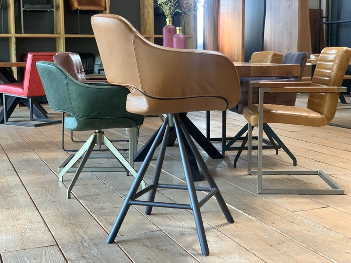 Barhocker Echtleder drehbar Seitenansicht, moderner Tresenstuhl mit gepolsterter Sitzschale und stabilem Metallgestell, hochwertiges Design für stilvolle Küchen- und Barbereiche.